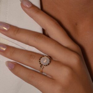 Mother of Pearl Ring with Smooth Heart in the Middle and Studded Around.